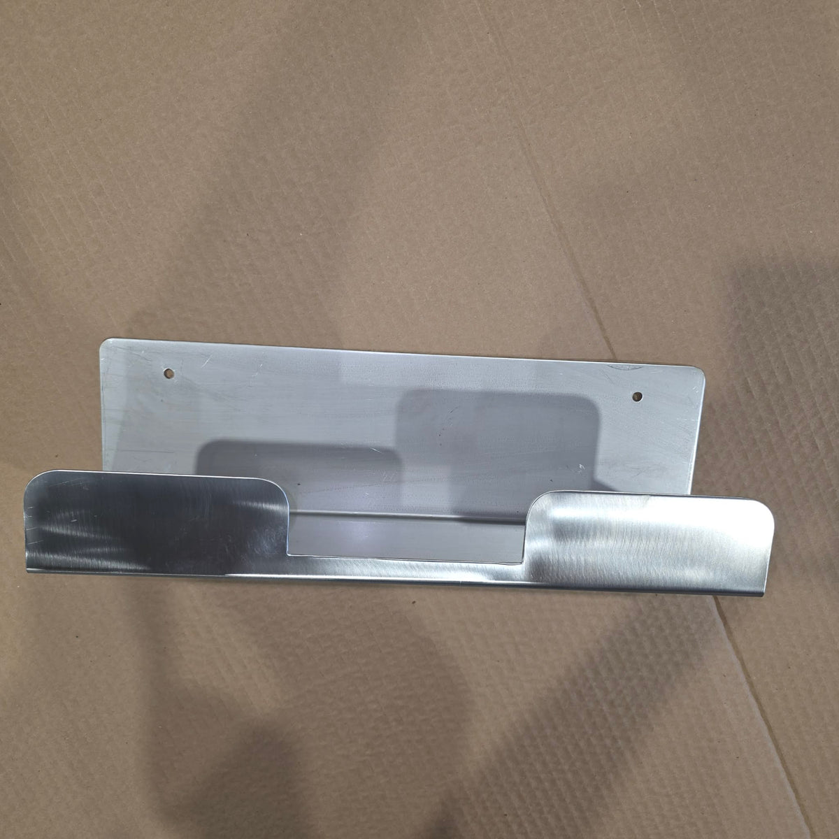NIP EXTENSION ARM HOLDER