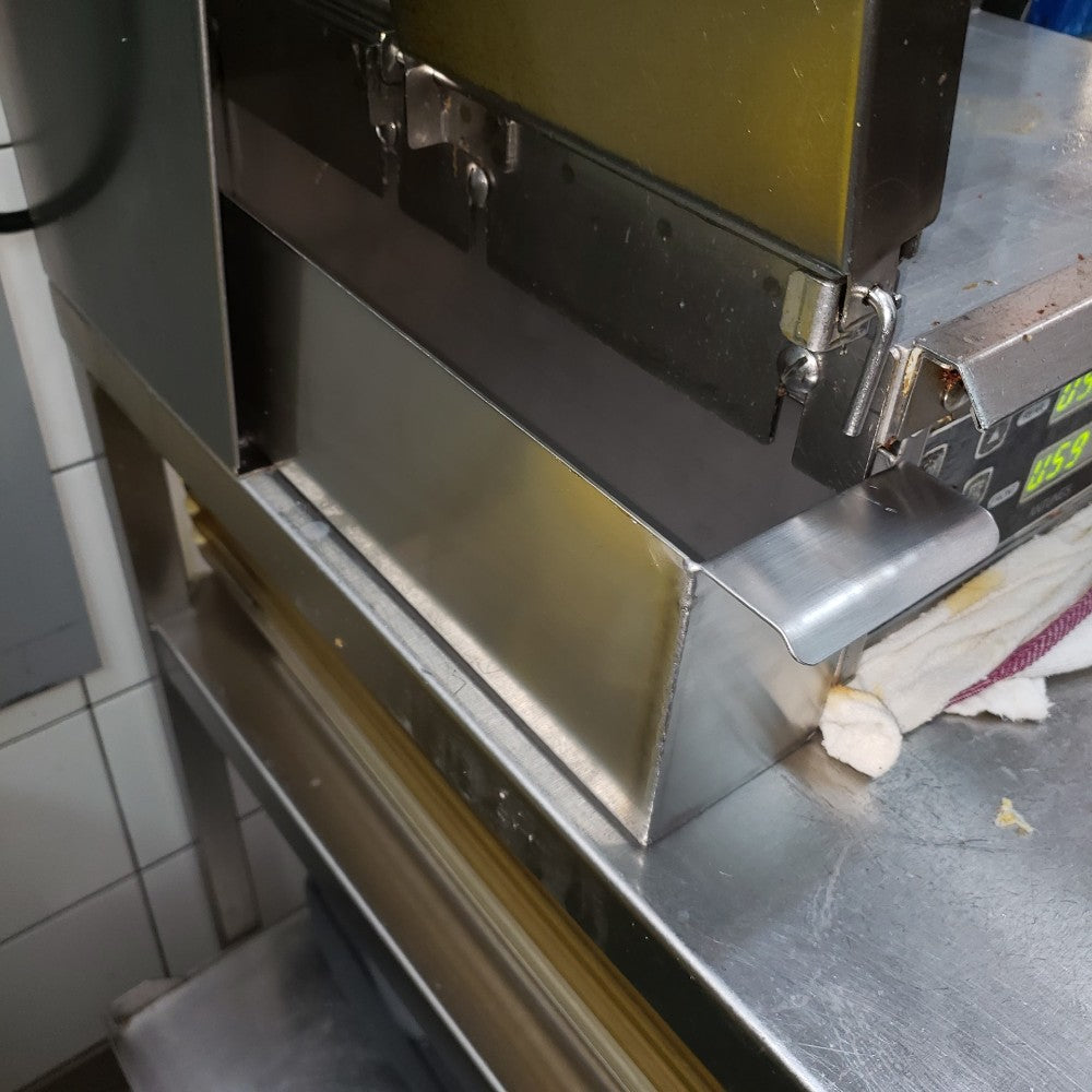 Scrap pan for egg cooker